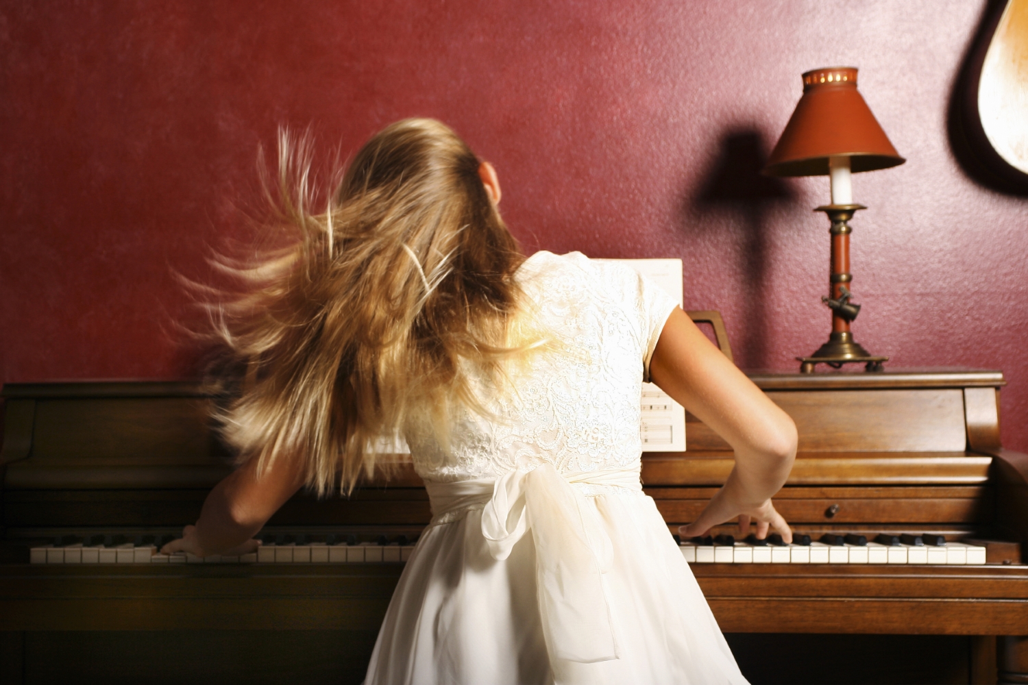 Girl Practicing the Piano